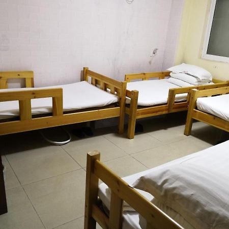 בייג'ינג Happy Dragon Courtyard Hostel מראה חיצוני תמונה