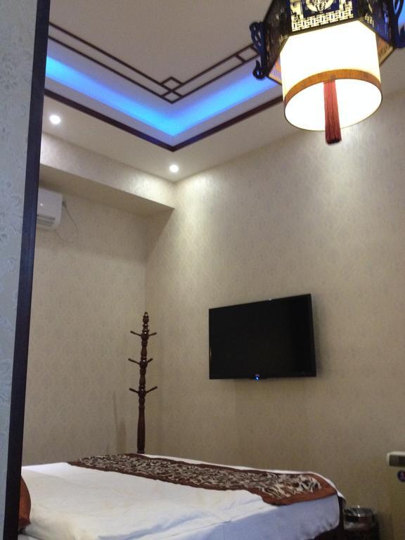 בייג'ינג Happy Dragon Courtyard Hostel מראה חיצוני תמונה